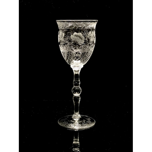 539 - Stevens and Williams, an Edwardian Stourbridge intaglio cut hock wine glass, circa 1905, the flared ... 