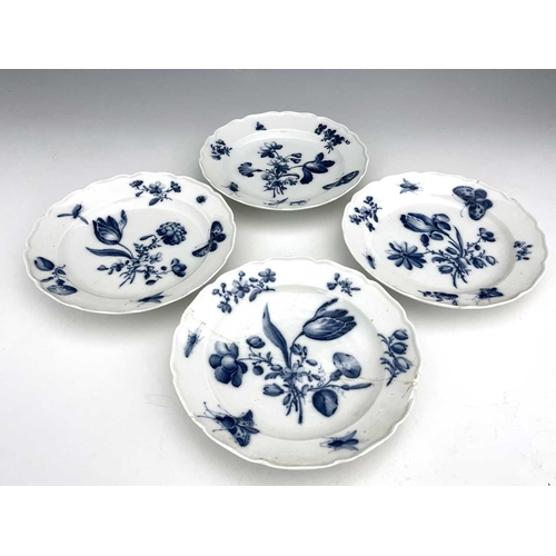 593 - Four Meissen blue and white plates, piecrust ogee rims, painted with central floral bouquets of tuli... 