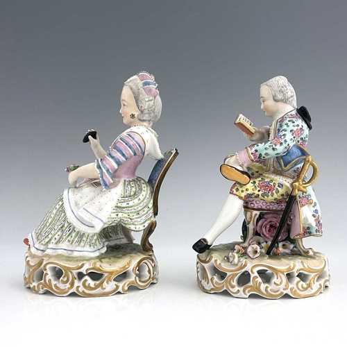 597 - A pair of Meissen type figures, probably late 18th century, model 137, modelled as a seated woman wi... 