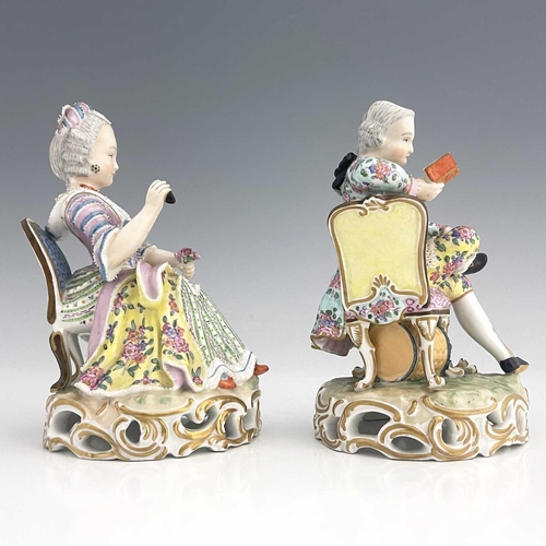 597 - A pair of Meissen type figures, probably late 18th century, model 137, modelled as a seated woman wi... 