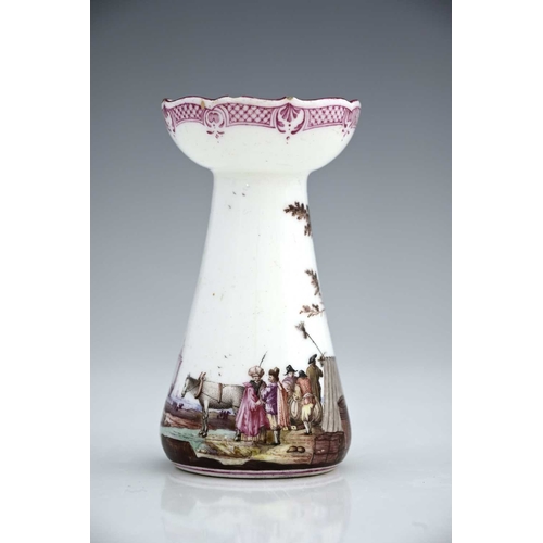 601 - A Vincennes porcelain candlestick, 1745-50, conical hyacinth vase form with ogee rim, the body paint... 