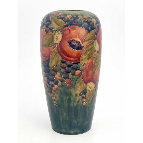 603 - William Moorcroft for Liberty and Co., a Pomegranate vase, circa 1911, shouldered form, ochre ground... 