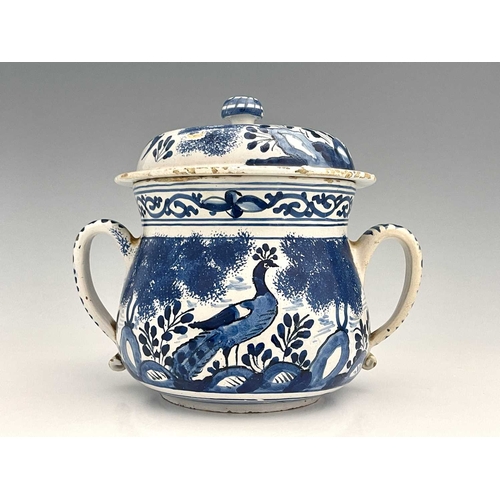 743 - A William and Mary Bristol Delft posset pot and cover, circa 1690, twin handled squat baluster form,... 