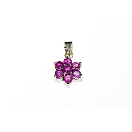 8 - A pink sapphire floral clustre pendant, 1.1cm diameter, 1.6g