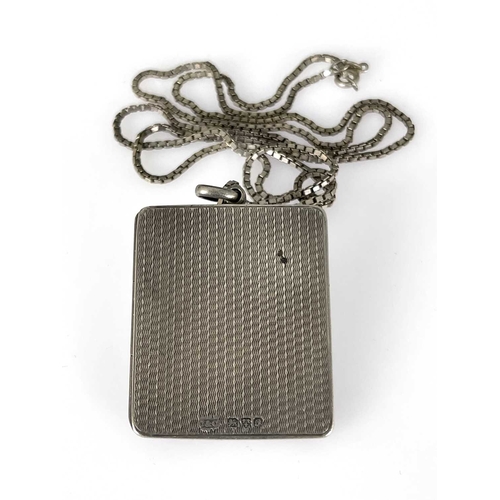 9 - A George V silver pendant locket photo frame, Cohen and Charles, Chester 1917, rectangular form, eng... 