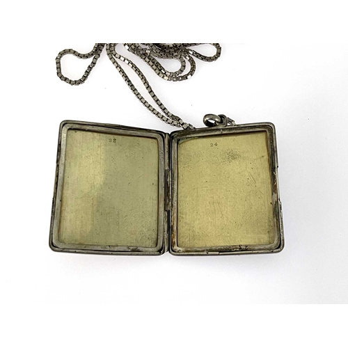 9 - A George V silver pendant locket photo frame, Cohen and Charles, Chester 1917, rectangular form, eng... 