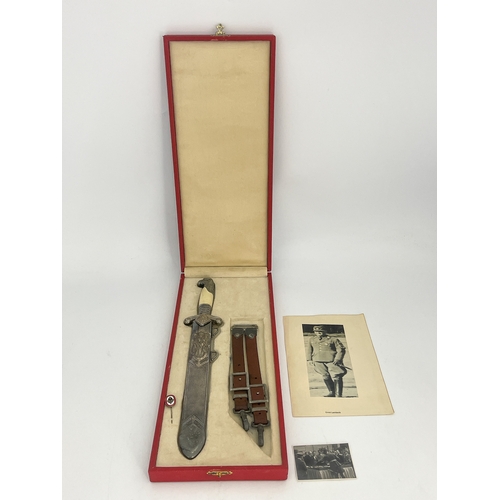 315 - A German Third Reich RAD officer's presentation dagger, awarded to Ernst Lambeck, eagle head hilt wi... 