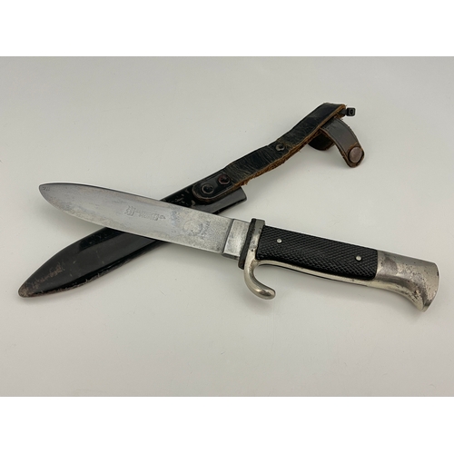 311 - A German Third Reich Hitler Youth knife, nickel pommel and crossguard, diced grip with inset enamel ... 