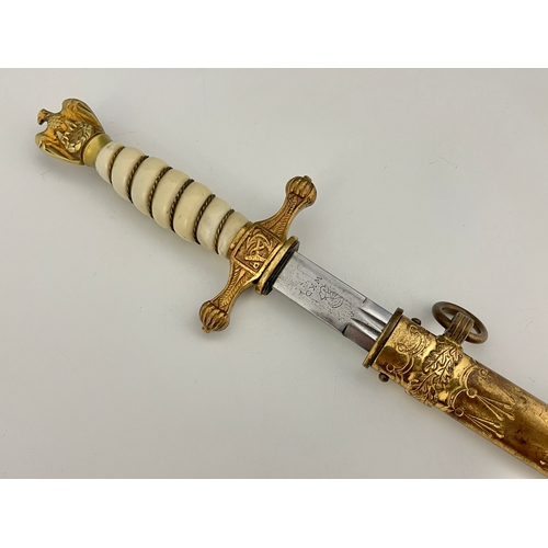 312 - A German Third Reich Naval Officer's dagger, gilt eagle finial, wire-bound white plastic grip, ancho... 