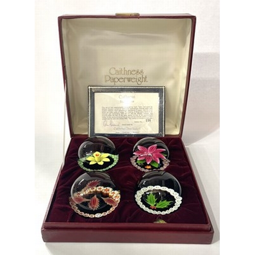Set of four Caithness millefiori and lampwork glass paperweights, 'Four
