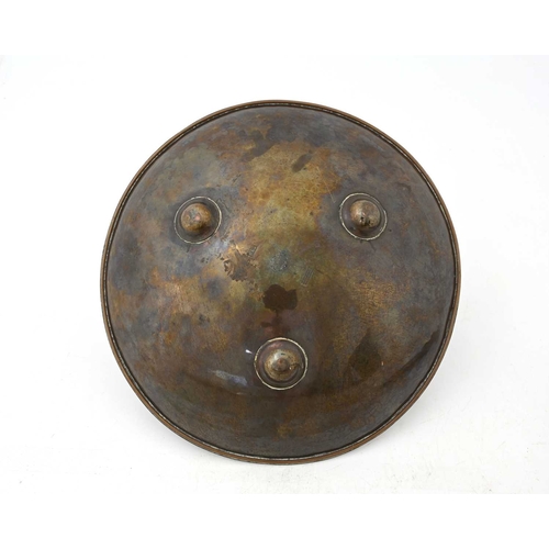 109 - Gordon Russell, an Arts and Crafts copper Lygon dish, planished shallow concave form on three domed ... 