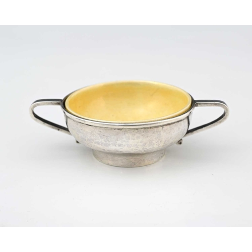 68 - A E Jones and Ruskin Pottery, an Arts and Crafts twin handled silver and ceramic lined salt cellar, ... 