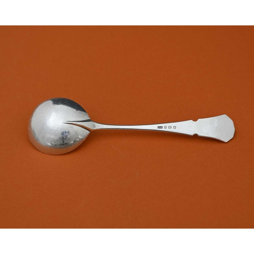 77 - John Sidney Reeve, an Arts and Crafts silver spoon, Birmingham 1938, the planished rounded bowl with... 