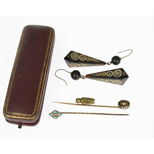 8 - Two diamond and gem-set stickpins and a pair of tortoiseshell drop earrings