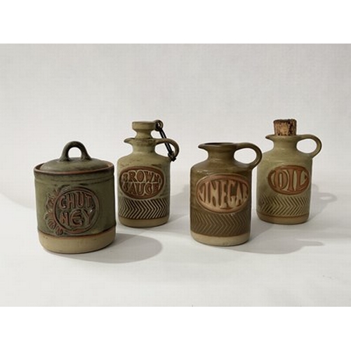 10 - Denby stoneware pottery: oil, brown sauce, chutney and vinegar vessels together with hand painted Su... 