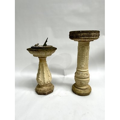 1003 - A sandstone composite birdbath with Roman numerals dial and front figurine, measuring 81.5cm high an... 