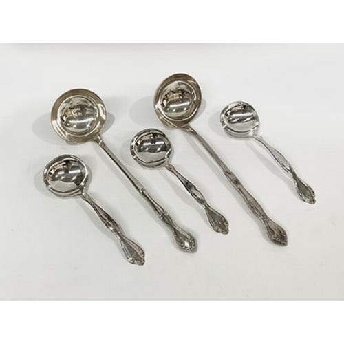 109 - A large assortment of silver plated ladles and cutlery (1 tray)