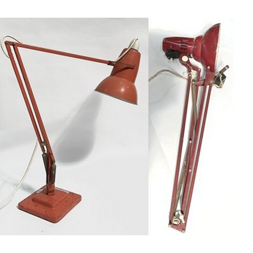 113 - George Carwardine for Herbert Terry, an orange painted anglepoise lamp, circa mid-century, together ... 