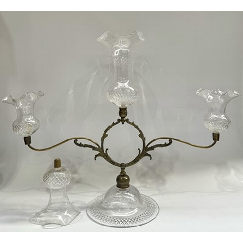 130 - A regency style two-armed gilt metal and cut glass epergne after John Walsh Walsh, 43cm high, togeth... 