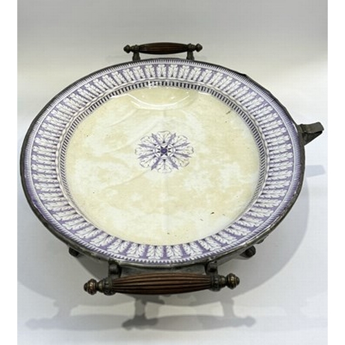 133 - A 19th century plated domed footed serving platter with elaborately cast naturalistic handle decorat... 