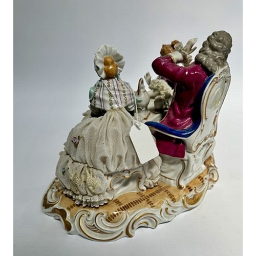 147 - A large Unter Weiss Bach porcelain figure group of two ladies and a gentleman in 18th-century dress,... 