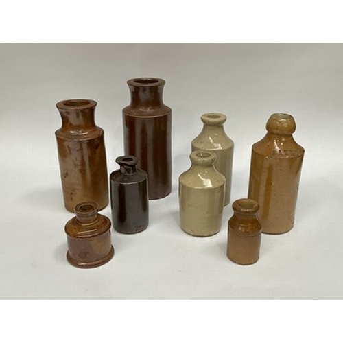 17 - A collection of stoneware bottles, ceramic jars and inkwells (1 tray)