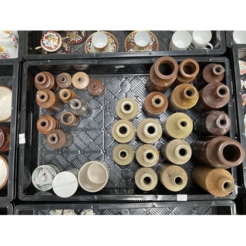 17 - A collection of stoneware bottles, ceramic jars and inkwells (1 tray)