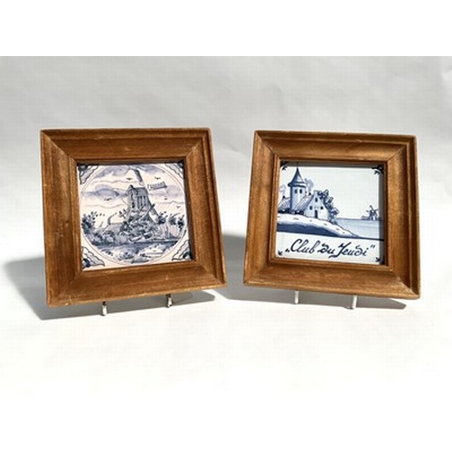 182 - A pair of carved framed Dutch Delft blue and white ceramic tiles, circa 19th century, approx 18.5cm ... 