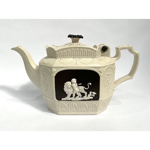 187 - A 19th-century Castleford teapot with a neoclassical scene of a cherub and lion, salt-glazed, 30cm w... 