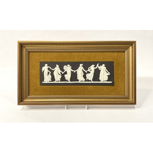 189 - A Wedgwood black basalt dancing maidens plaque, mounted and framed, 7 by 21cm, boxed