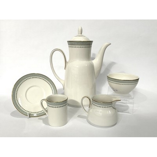 191 - A set of Royal Doulton, 'Berkshire' porcelain coffee service with Honeysuckle rim in sage green, set... 