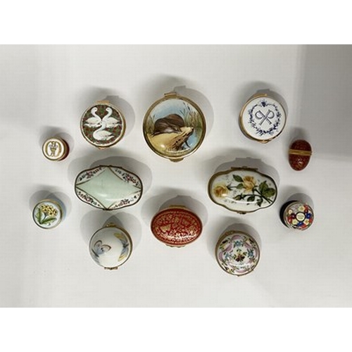 199 - A collection of twelve enamel trinket boxes, including Staffordshire Enamels WWF box, Halcyon Days, ... 