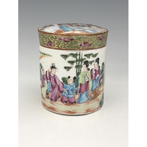 206 - A Chinese famille rose jar and cover or tea caddy, Canton, cylindrical form, painted in the round wi... 