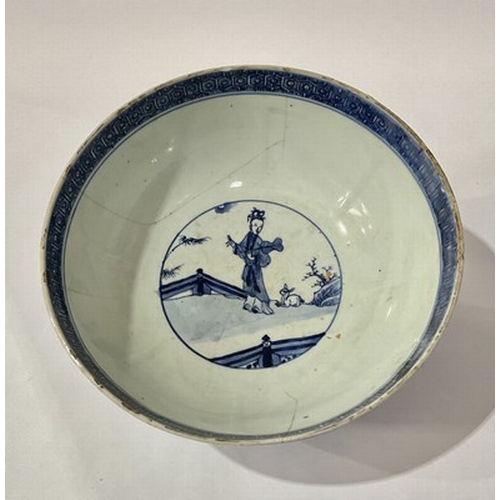 213 - A Chinese blue and white bowl, footed form, painted with panels of boys within a foliate border, 24c... 