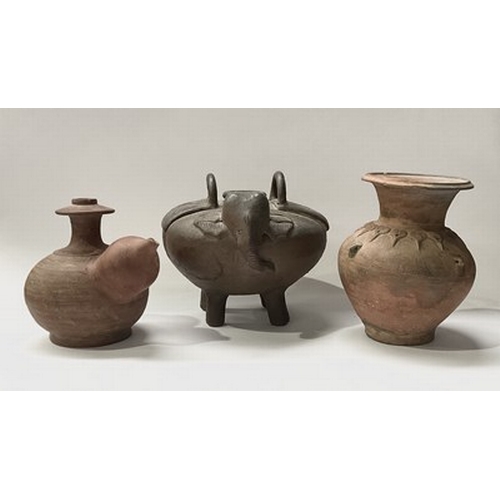 22 - A collection of terracotta vessels an inverse baluster form vessel of pre-Columbian style decorated ... 