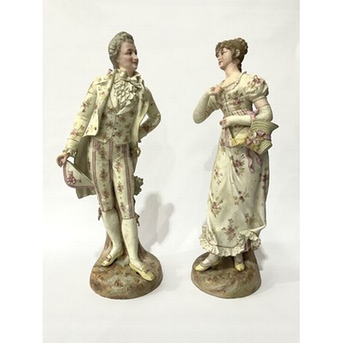 235 - A pair or continental ceramic figures, approx 37cm high (2)