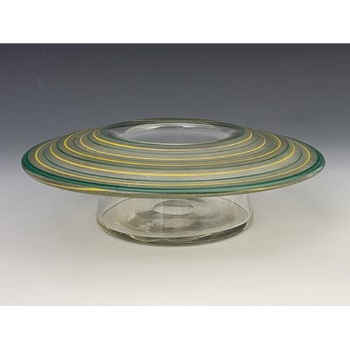 262 - An Art Deco enamelled glass posy bowl, the broad rimmed form with concentric bands in frosted green ... 