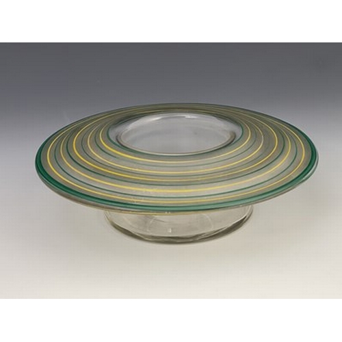 262 - An Art Deco enamelled glass posy bowl, the broad rimmed form with concentric bands in frosted green ... 