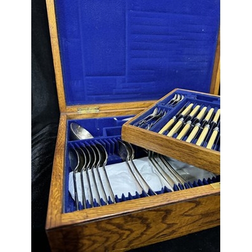 287 - A case of plated flatware retailed by Army and Navy together with a 5-drawer spice cabinet (2)