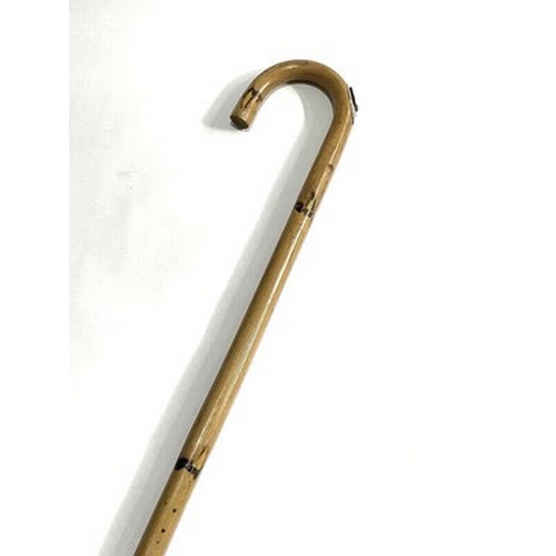 292 - Bamboo horse-measuring walking stick with concealed telescopic rule and spirit level, 94cm