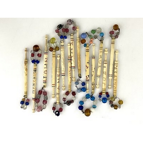 299 - Fifteen inscribed antique bone lace bobbins, twelve named, Levinia, Emma, Job, John, Sarah, Jane, Ph... 