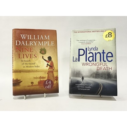 39 - An assortment of mostly modern novels and history books, including Nine Lives by William Dalrymple a... 