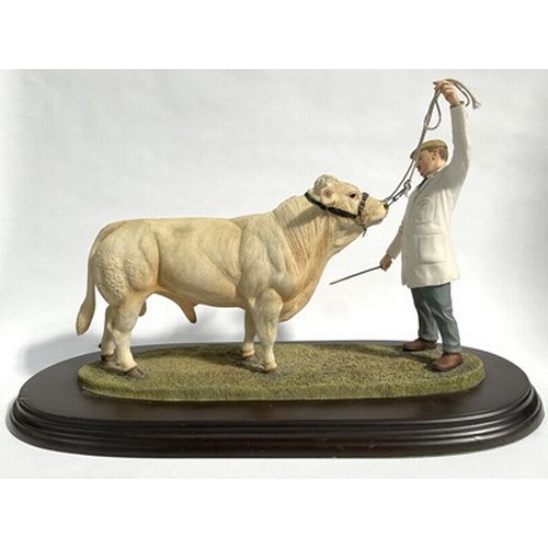 514 - Sample 'Best in show' by Country Artists, a figurine of a Charolais Bull being inspected by a judge ... 