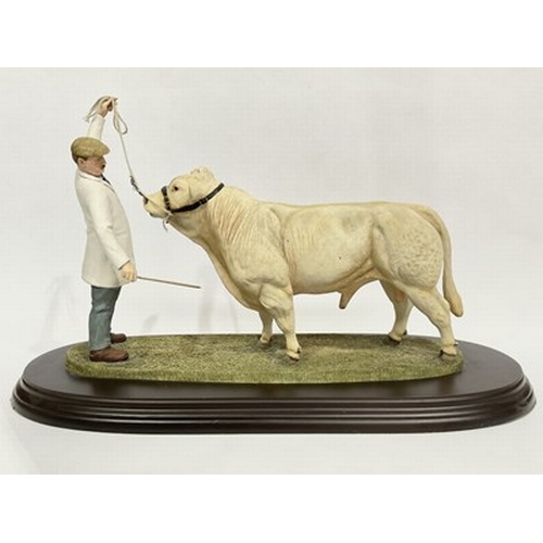 514 - Sample 'Best in show' by Country Artists, a figurine of a Charolais Bull being inspected by a judge ... 