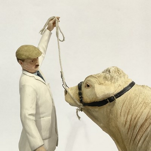 514 - Sample 'Best in show' by Country Artists, a figurine of a Charolais Bull being inspected by a judge ... 