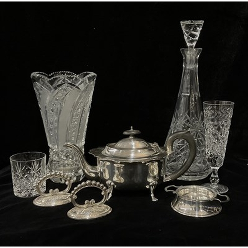 53 - A large assortment of silver plated tableware along with a collection of cut glass and crystal wares... 