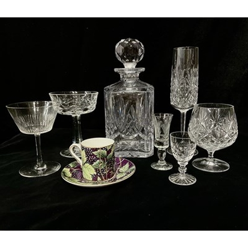 54 - A selection of cut crystal drinking glasses by Powell & Sons, Stuart etc. including champagne coupes... 