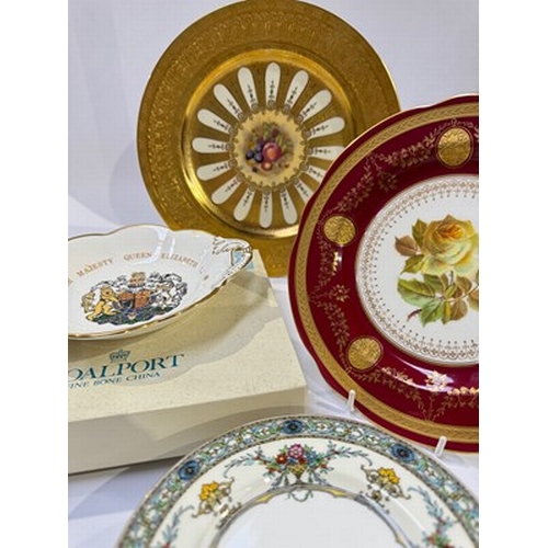 57 - A Meissen relief moulded and gilt cabinet plate, an Aynsley fruit and tooled gilt cabinet plate and ... 