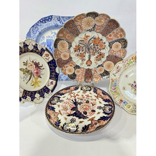 58 - A collection of ceramics: three gilded plates in the Imari palette including Royal Crown Derby, toge... 