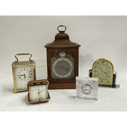 6 - A selection of mid-century travel clocks, together with an assortment of wristwatches and pocketwatc... 